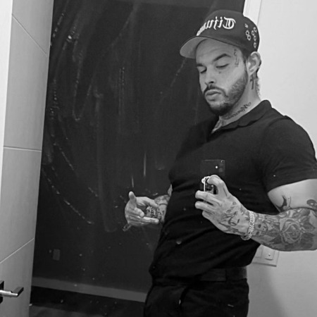 Emiliano Aguilar flaunting his tattoos.